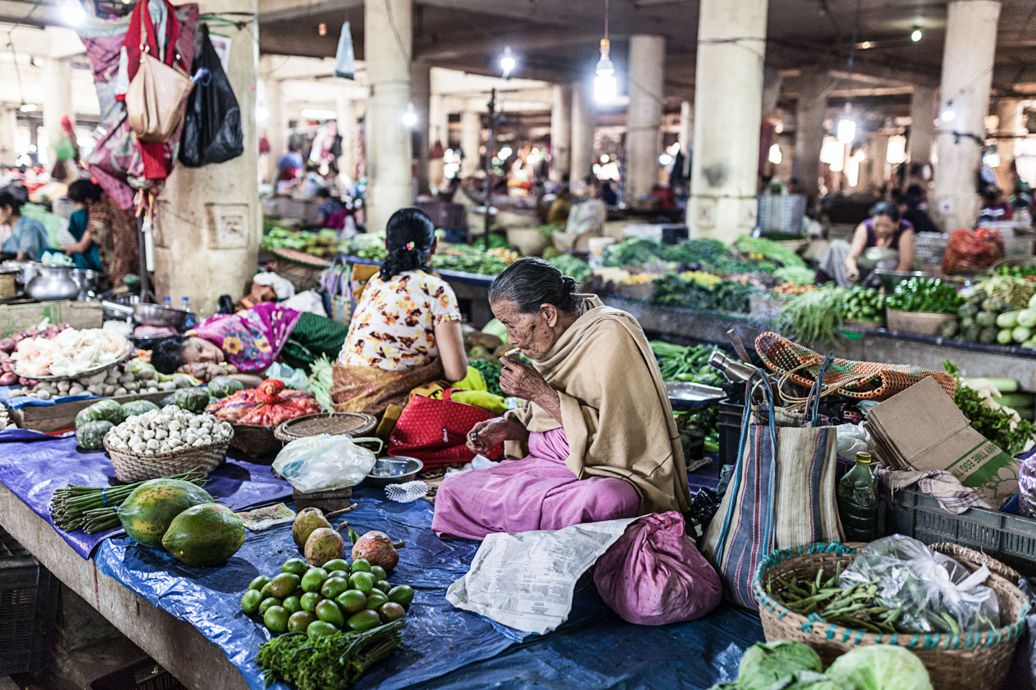 Smoke Break at Ema Keithel. The market was atmospheric, warm, friendly, and engaging – a spectacular display of everything good about humanity – and one of the best sights I've seen anywhere.