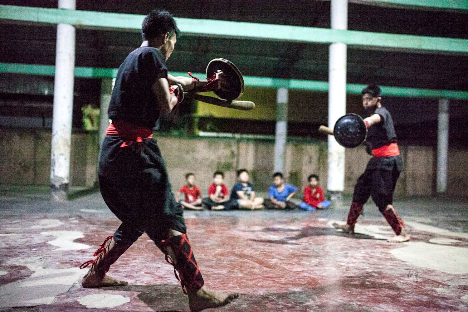 Before leaving, I saw Thang-ta, Manipur's martial art. The sun set as a boy swept and threw water in a purification ritual. The fight showed me why Manipuri men were once feared as excellent warriors.