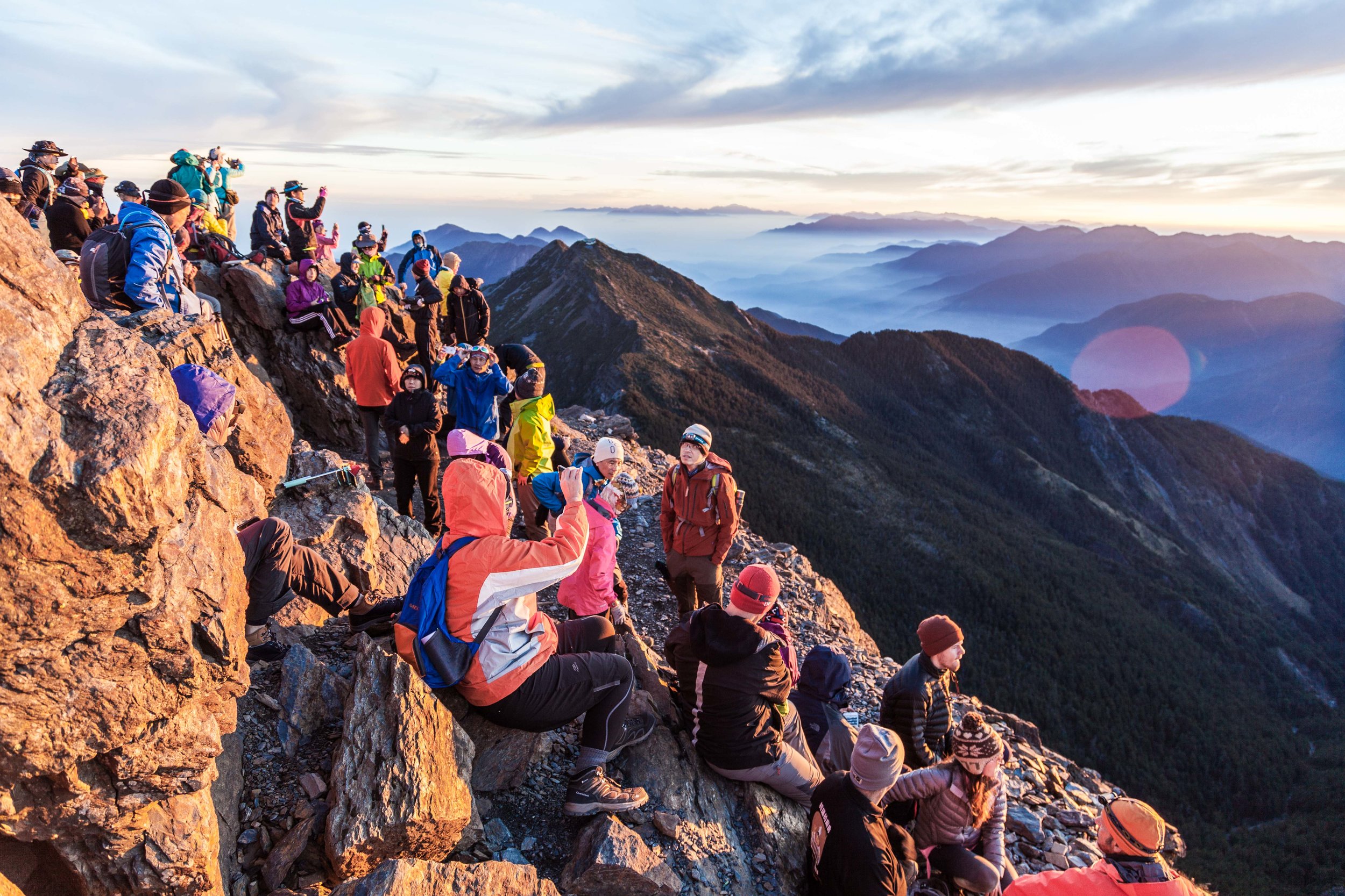 My fellow hikers at the summit of Jade Mountain. Permits are difficult to acquire, so I went with the excellent Blue Skies Adventures who took care of it all.