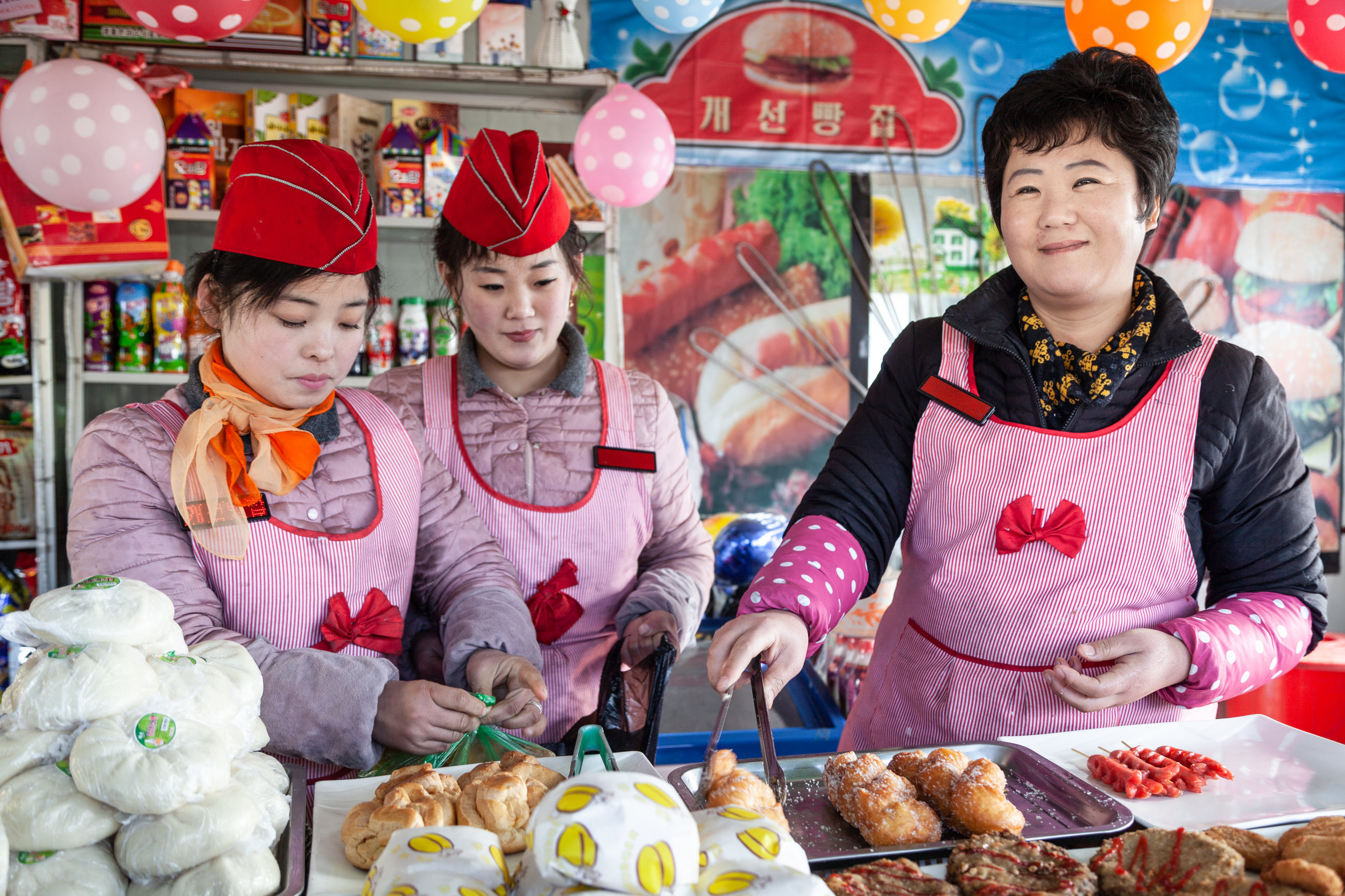 A friendly snack-seller near Pyongyang Railway Station.