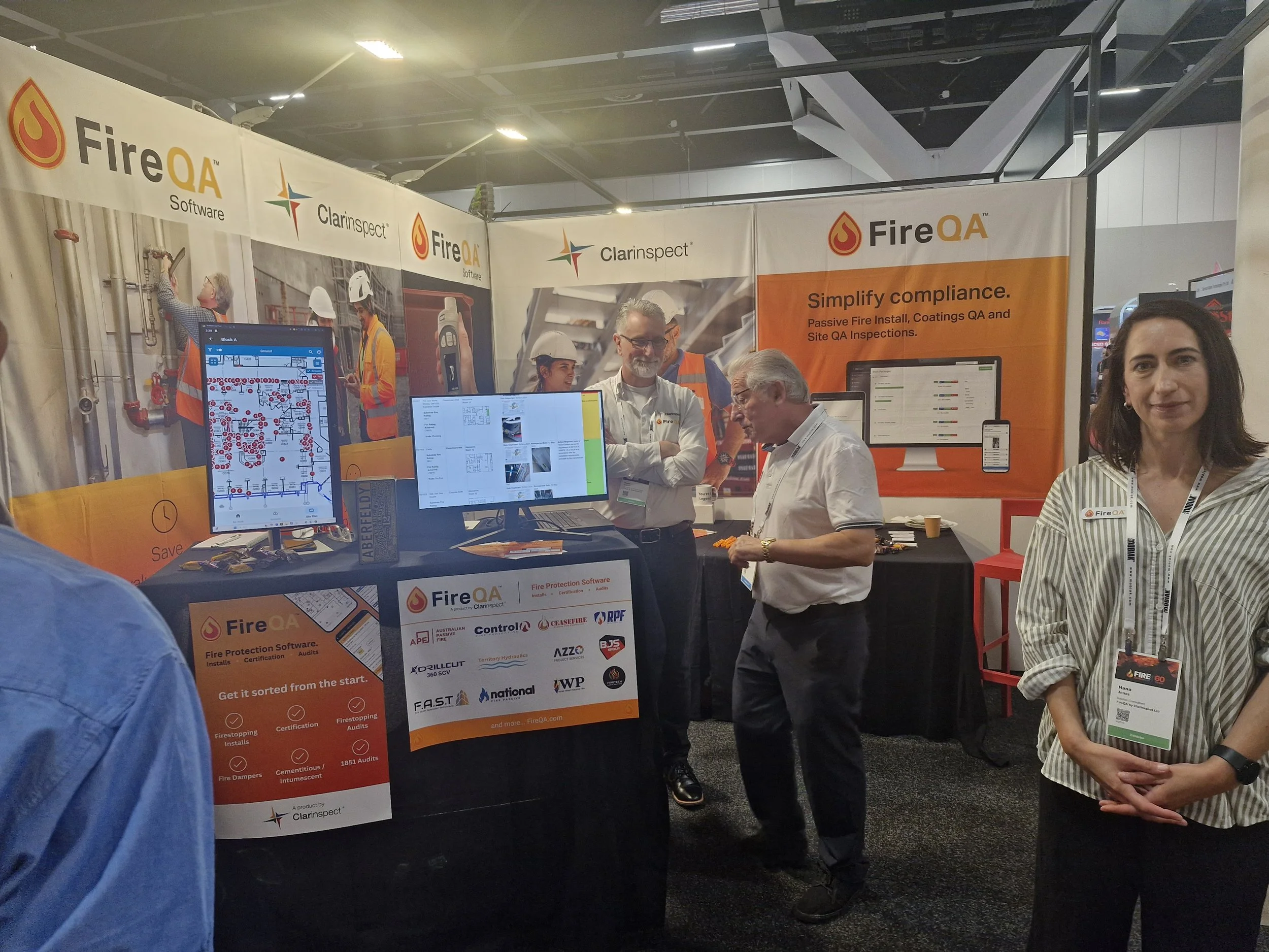 FireQA team at the conference showing a passive fire install team the firestopping register