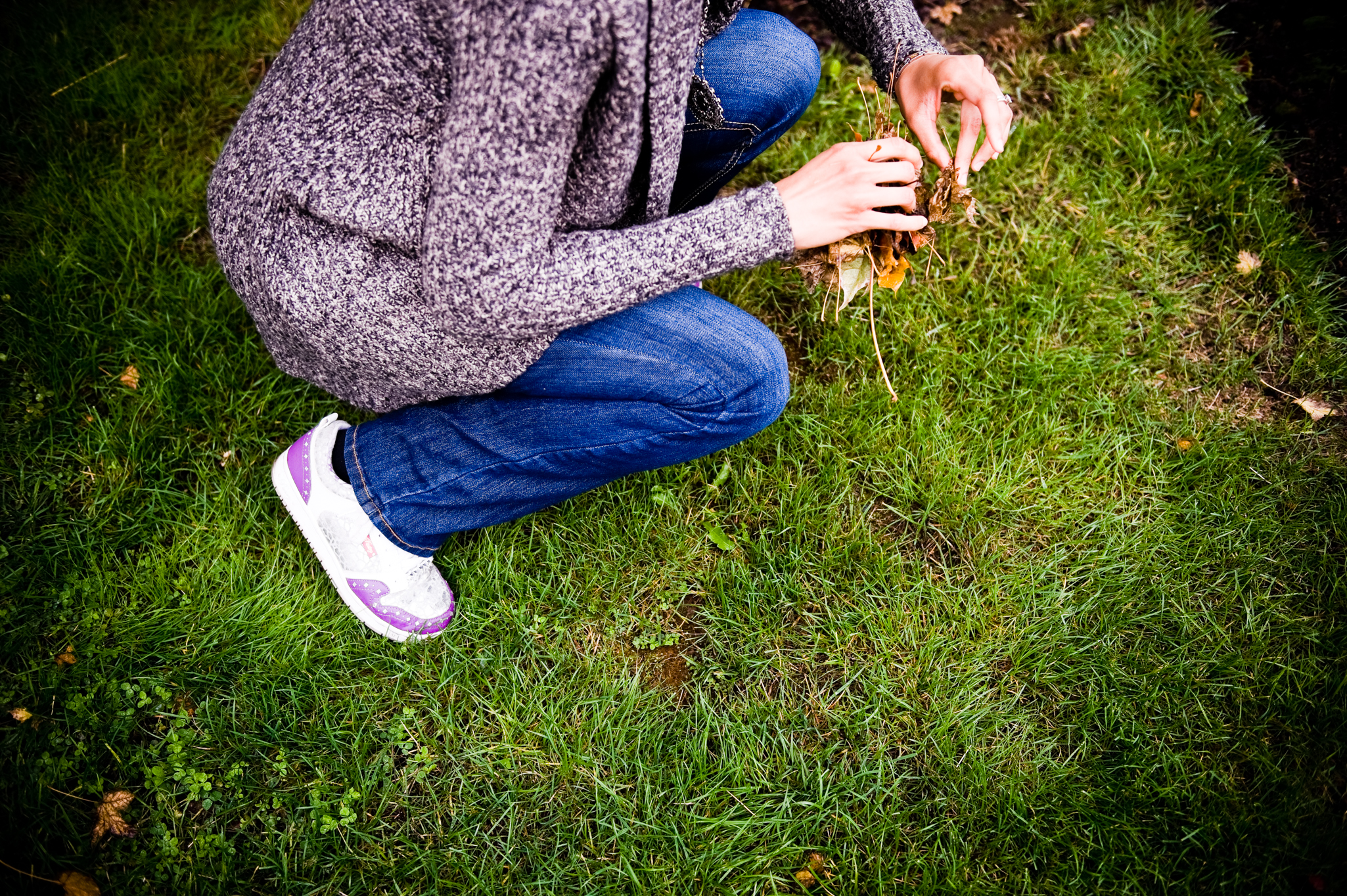  "In my next life I want to be born messy!" laughs E.A. as she picks up leaves off her yard one by one.    