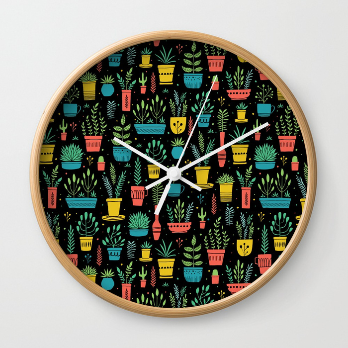 bright-window-plants-wall-clocks.jpg