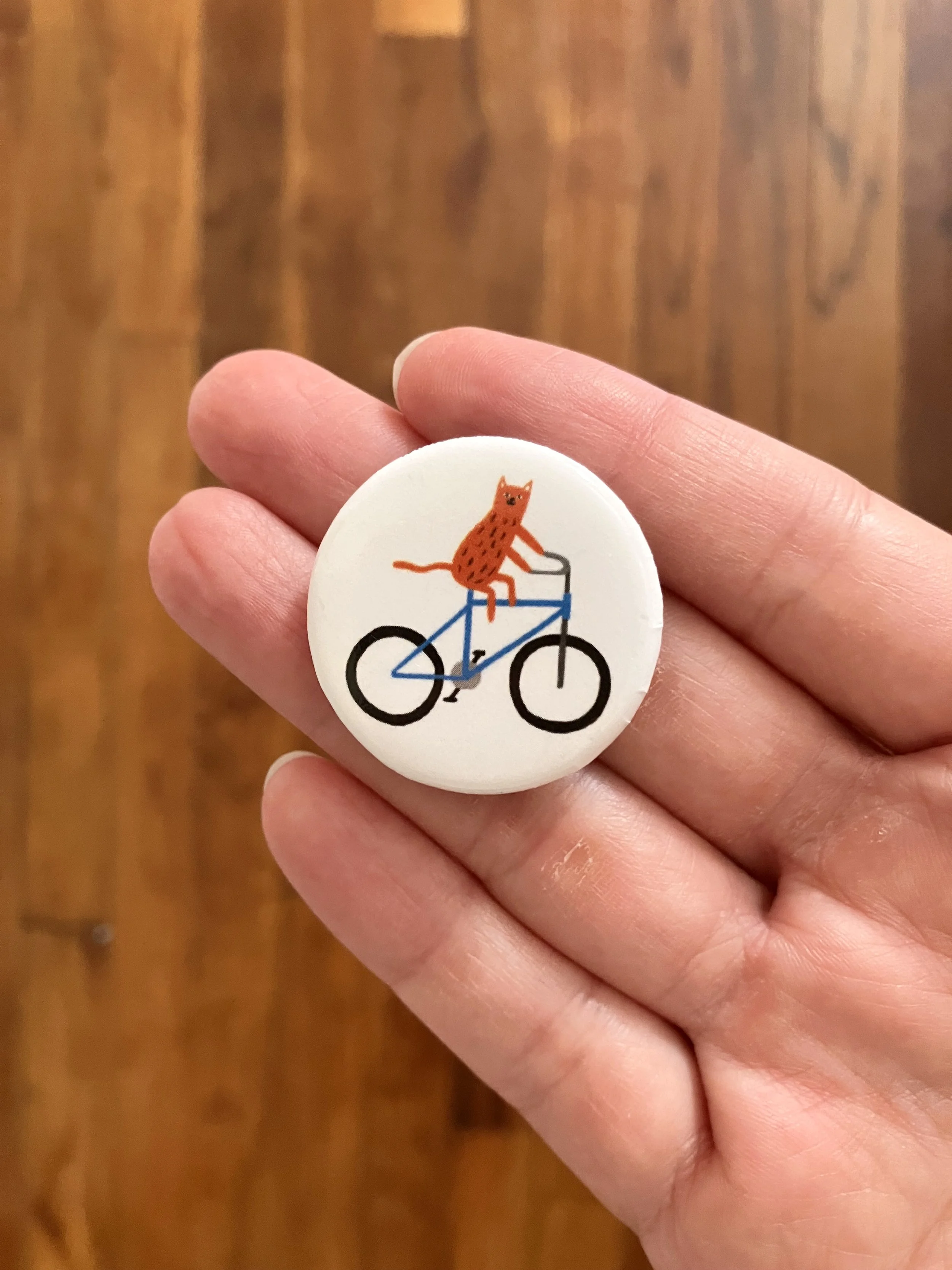 pin-back-button-bicycle-cat-by-kay-wolfersperger.jpeg