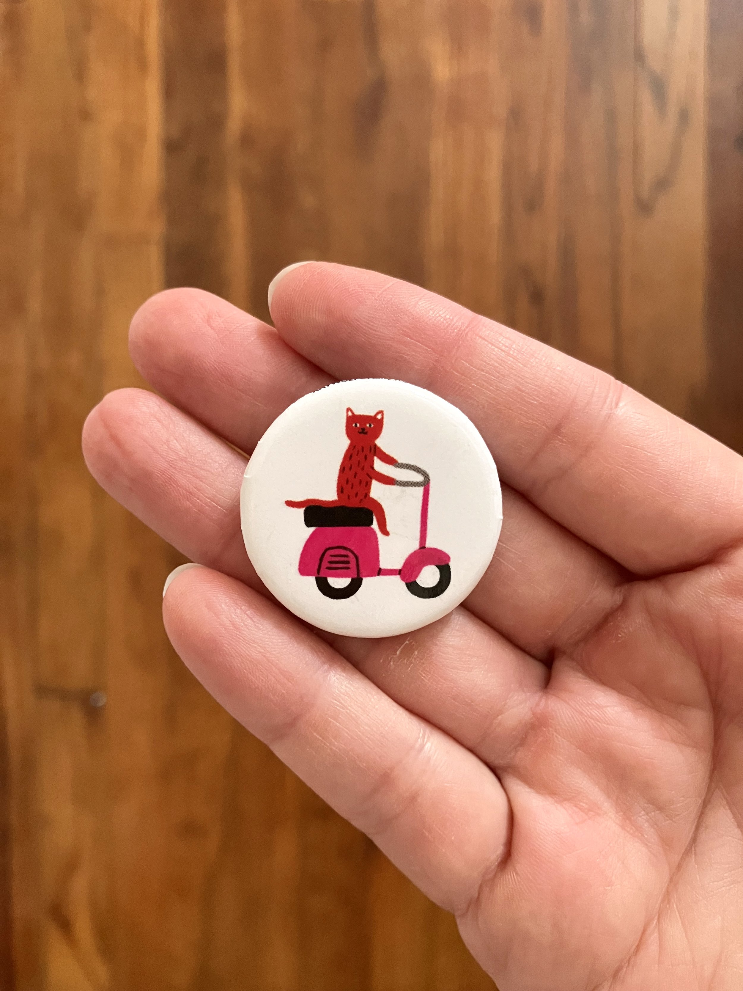 pin-back-button-scooter-cat-by-kay-wolfersperger.jpeg