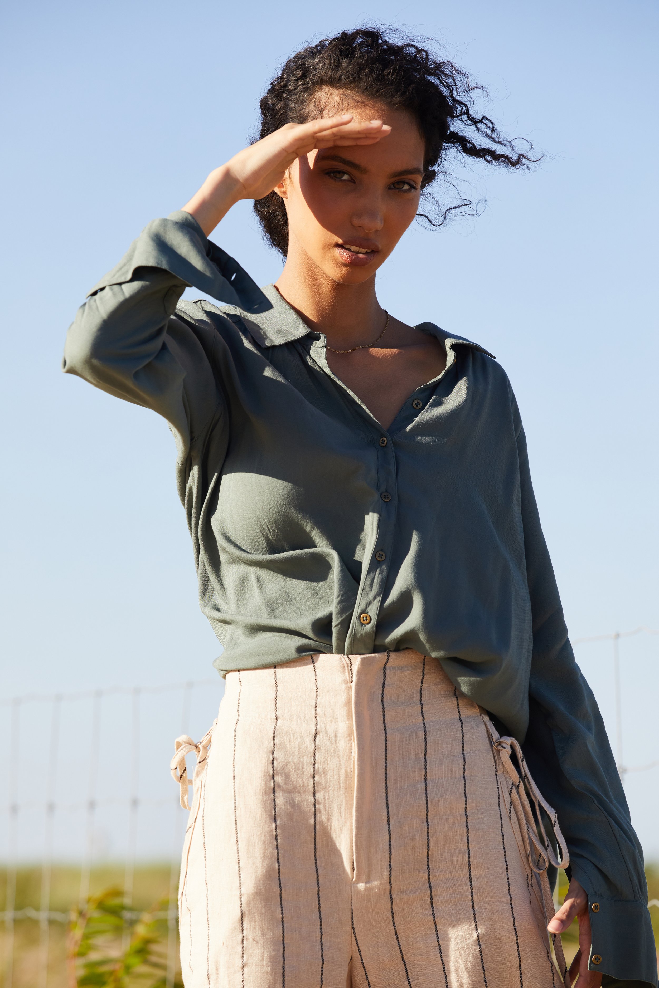 chicago-portrait-model-montrose-beach-windy-sandy-blue-tan-5