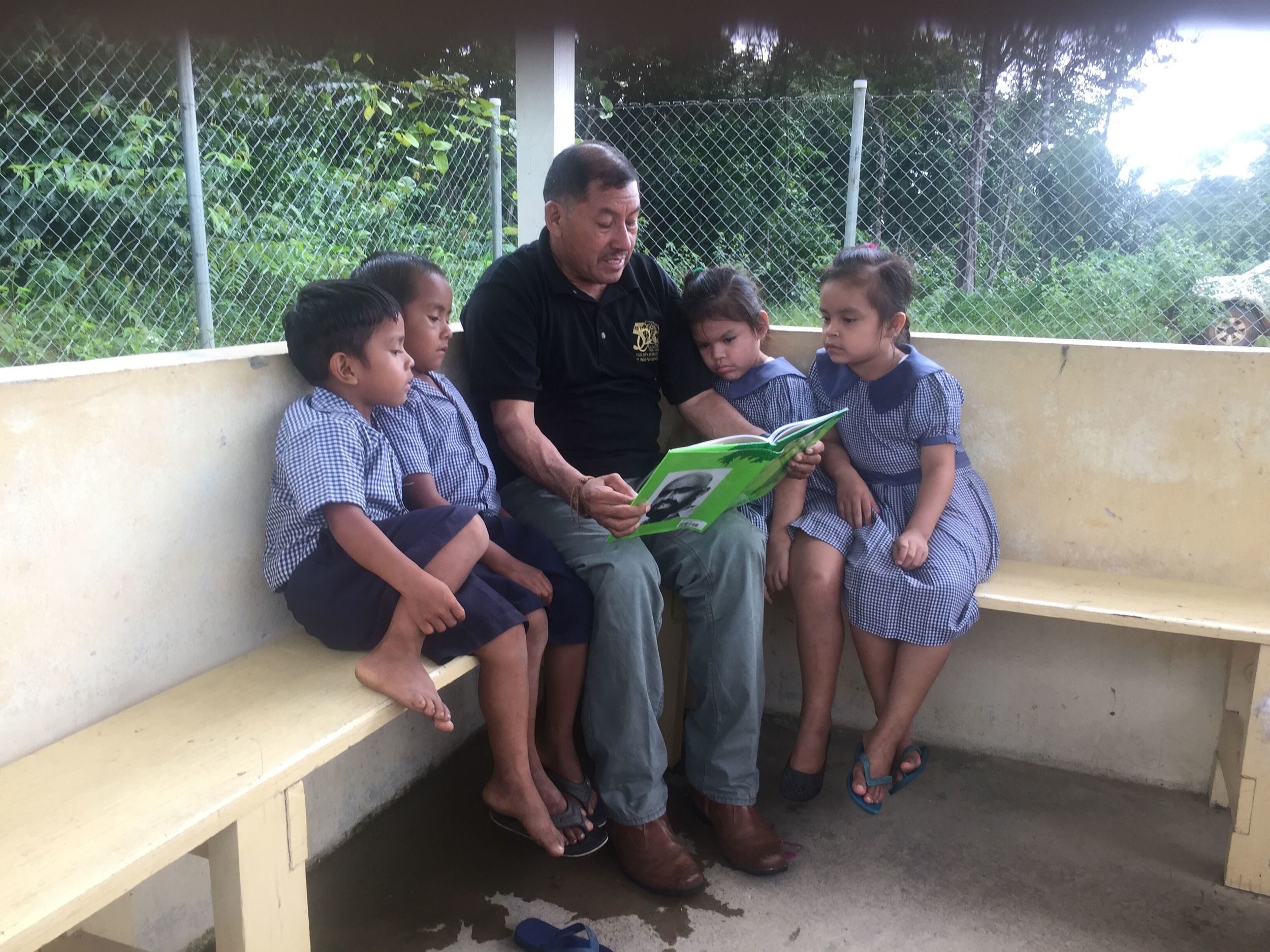 VP Sydney Allicock reading to children