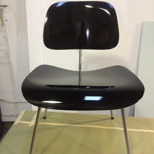 Black gloss lacquer on an Eames chair. Steve says: "This one's for Darth."