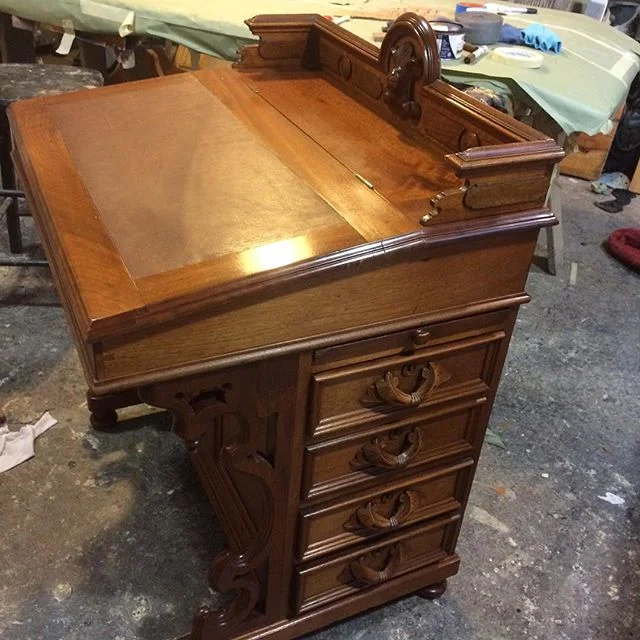 An antique desk restored by Steve.
