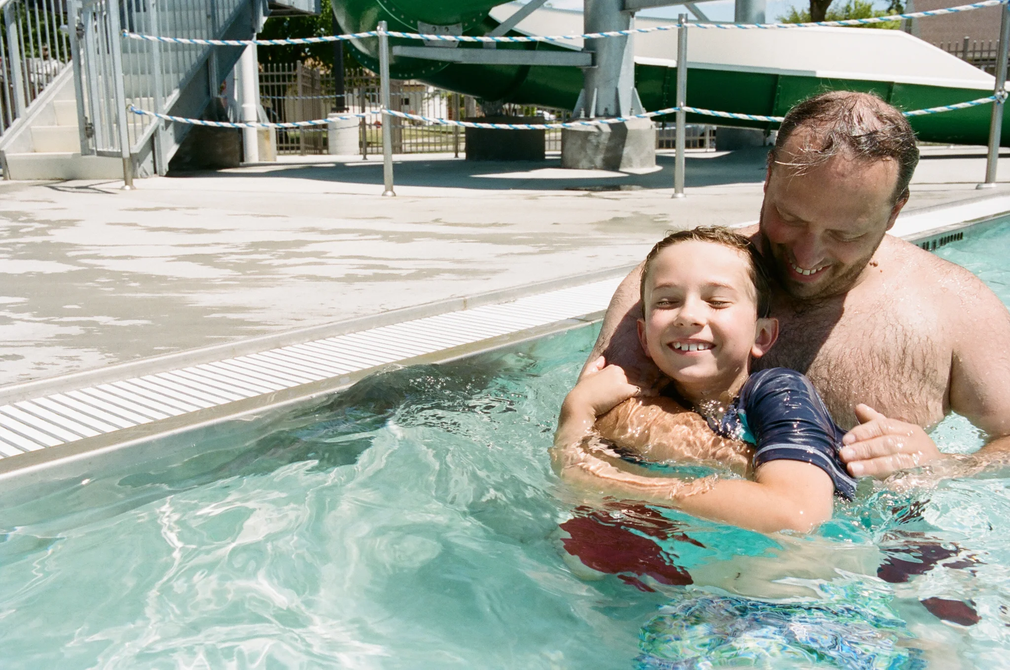 Boy and Dad in Pool