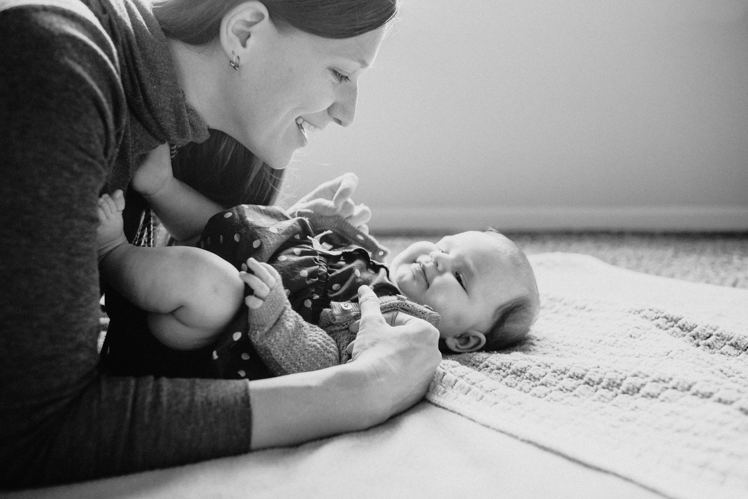 Mom talking to her baby girl.