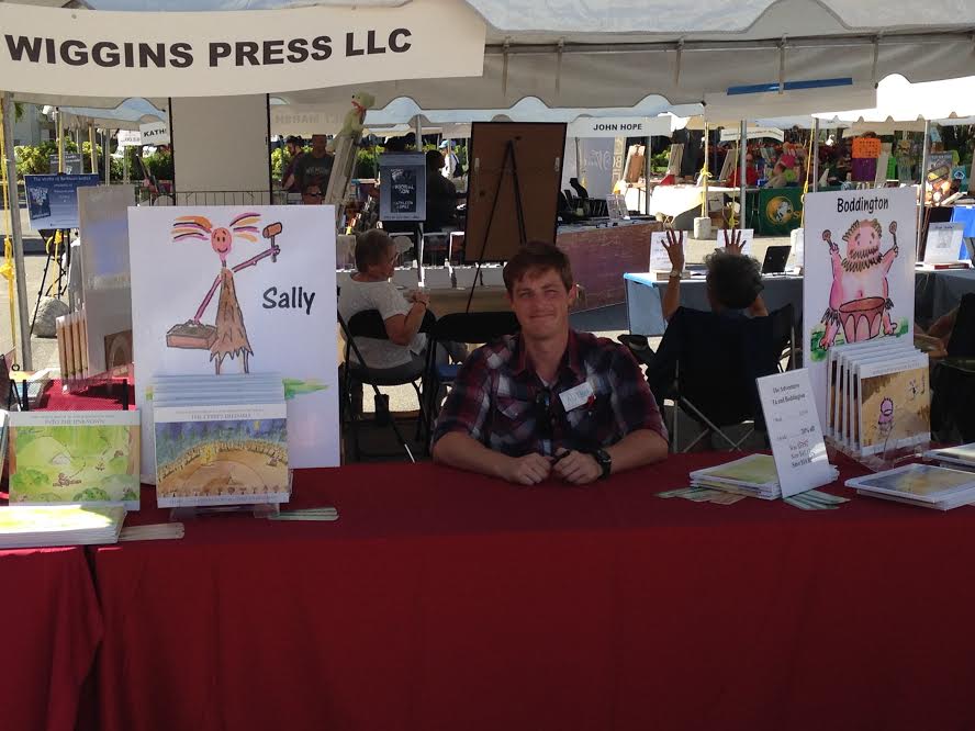 Author James Zwerneman displays his books at the Tampa Bay Times Festival of Reading in Tampa, FL.