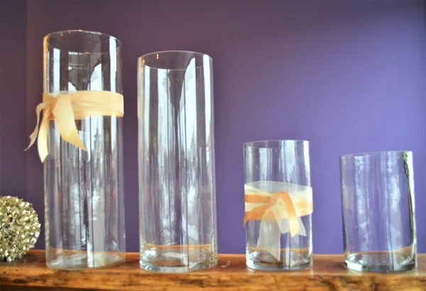 "5 Inch Wide Cylinder Vases 8 Inch- $3 9 Inch- $3 16 Inch- $5 18 Inch- $5