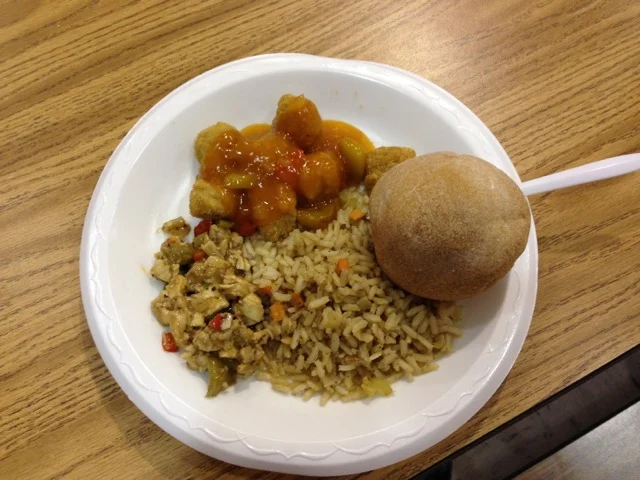 Sweet & sour chicken, chicken gumbo, rice, and fresh-baked bread.
