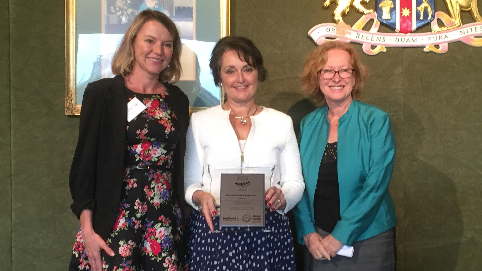 The Minister for Mental Health, the Hon. Pru Goward MP presents the award to DebO'Leary and Sharon Ramsay-Luck from ABC Commercial.