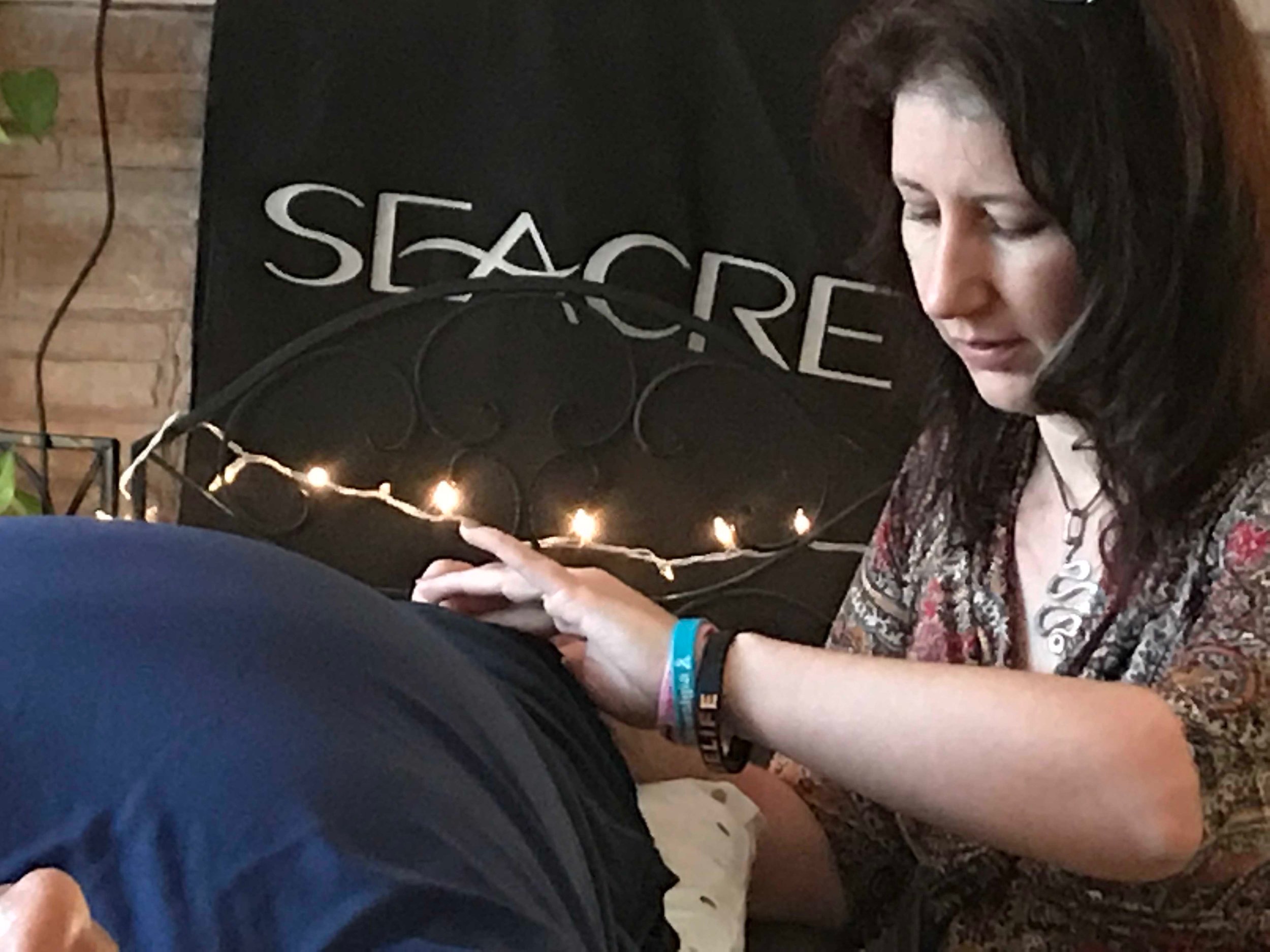 From the first Reverse button In-Person 3 Day retreat - Practitioner abby beauchamp works while sharing all the details in the recently published book: reverse button: Learn WHat the doctor’s aren’t telling you, avoid a back surgery, get back to fully living your life!