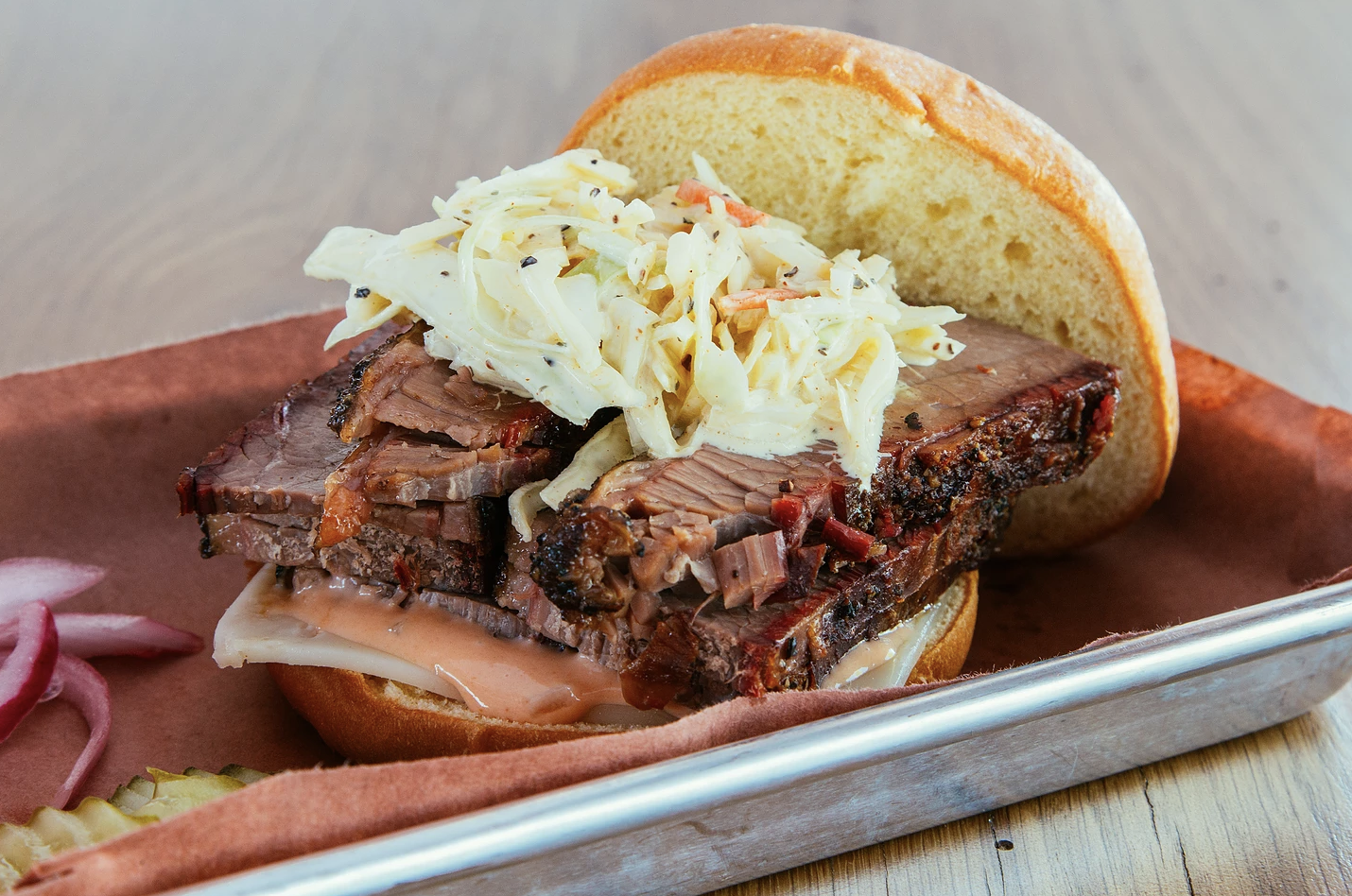 Brisket sandwich via Woodpile BBQ