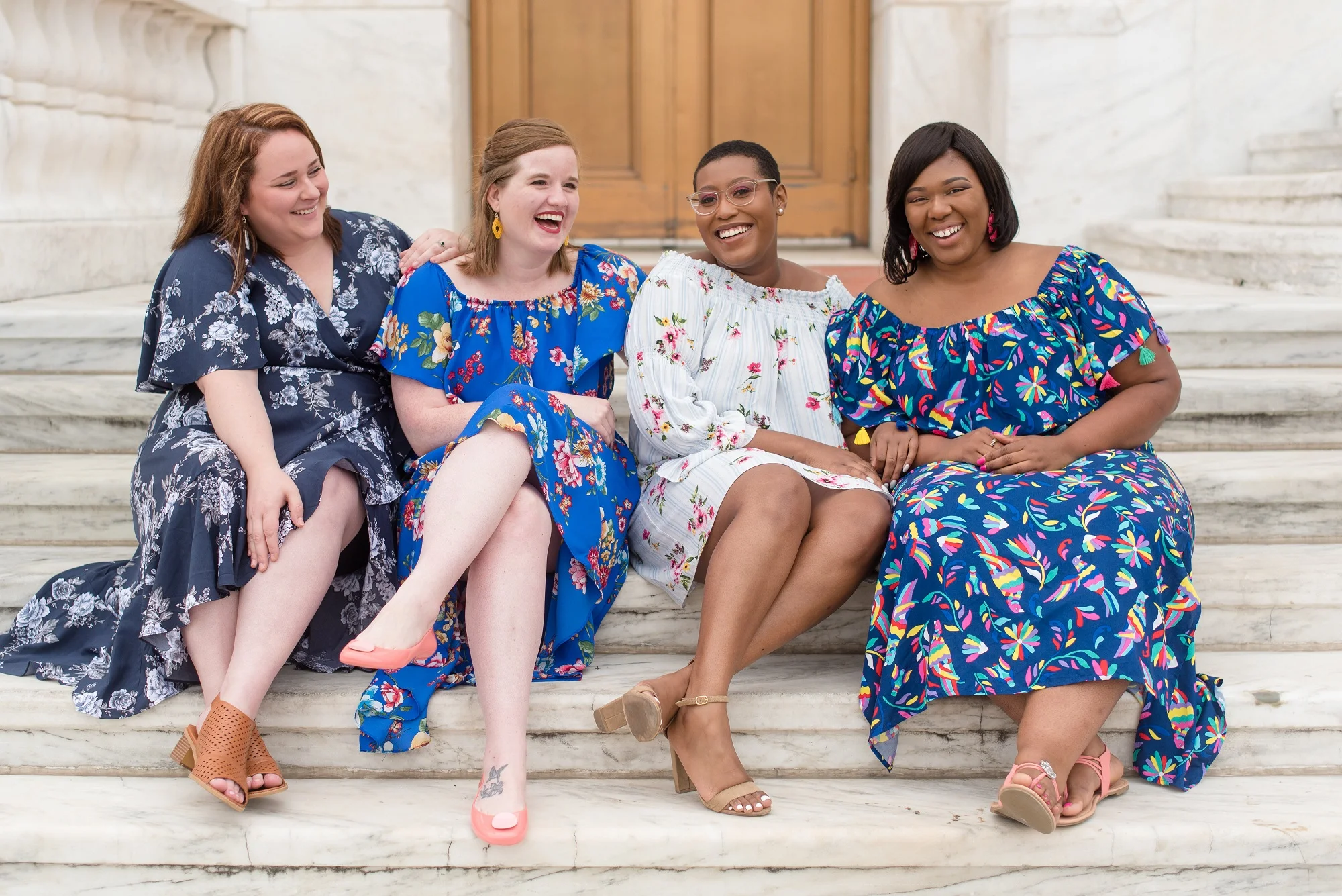 Can we take a second to talk about the gorgeous floral on these dresses? Photo via Jennifer Boris Photography