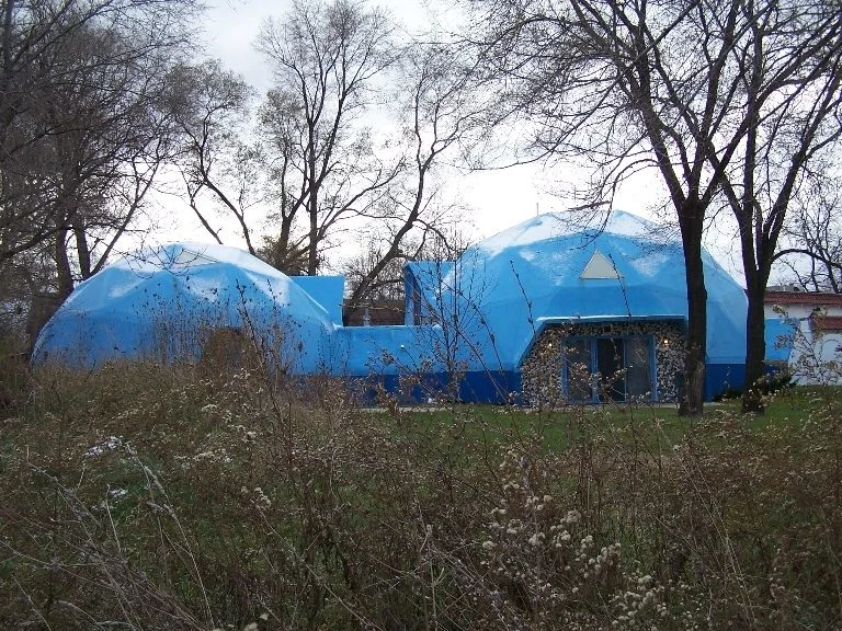 Geometric and blue houses, anyone? Photo via Atlas Obscura