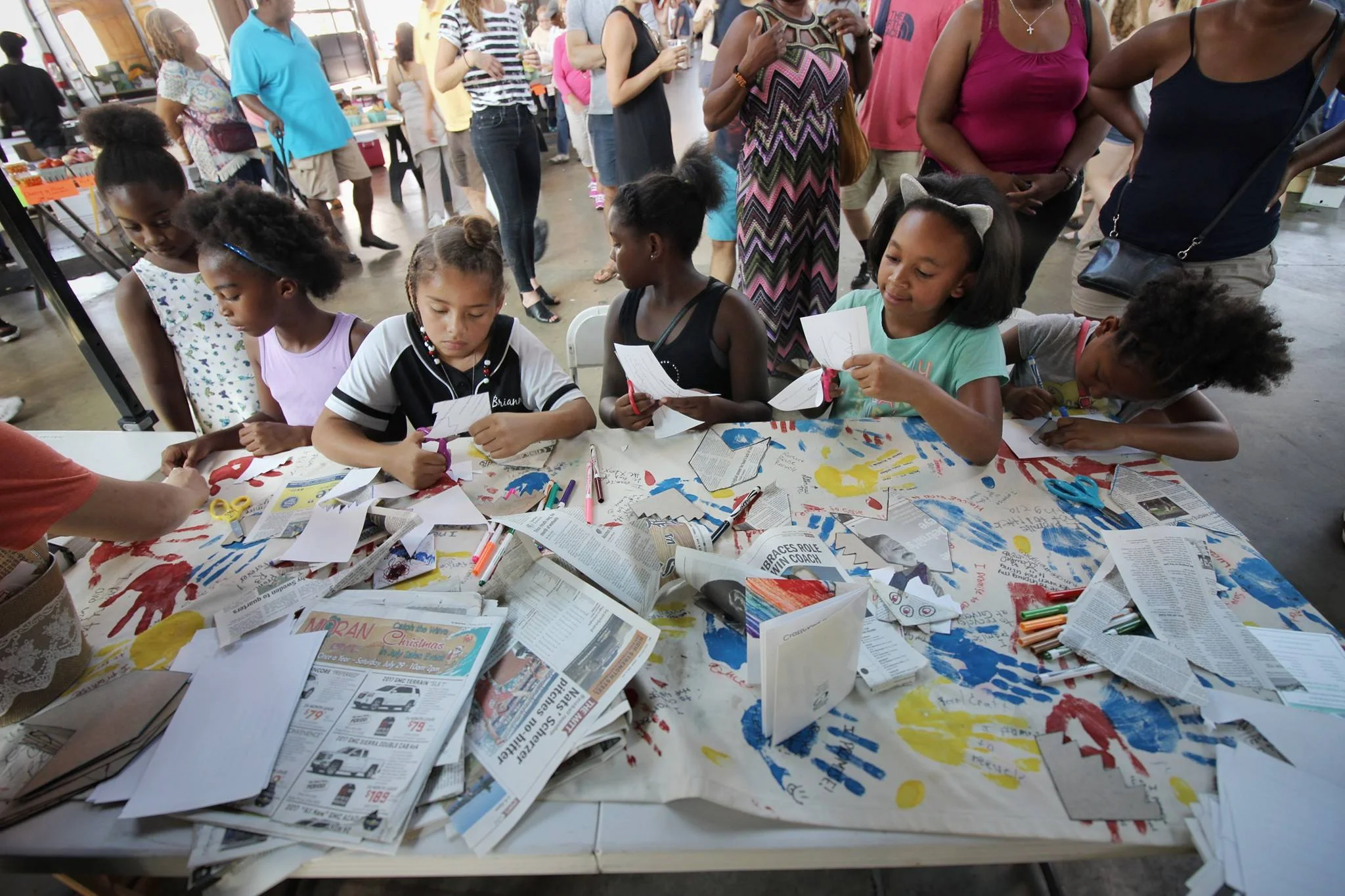 Photo via "Murals in the Market and Green Living Science Kid's Workshop" on Facebook