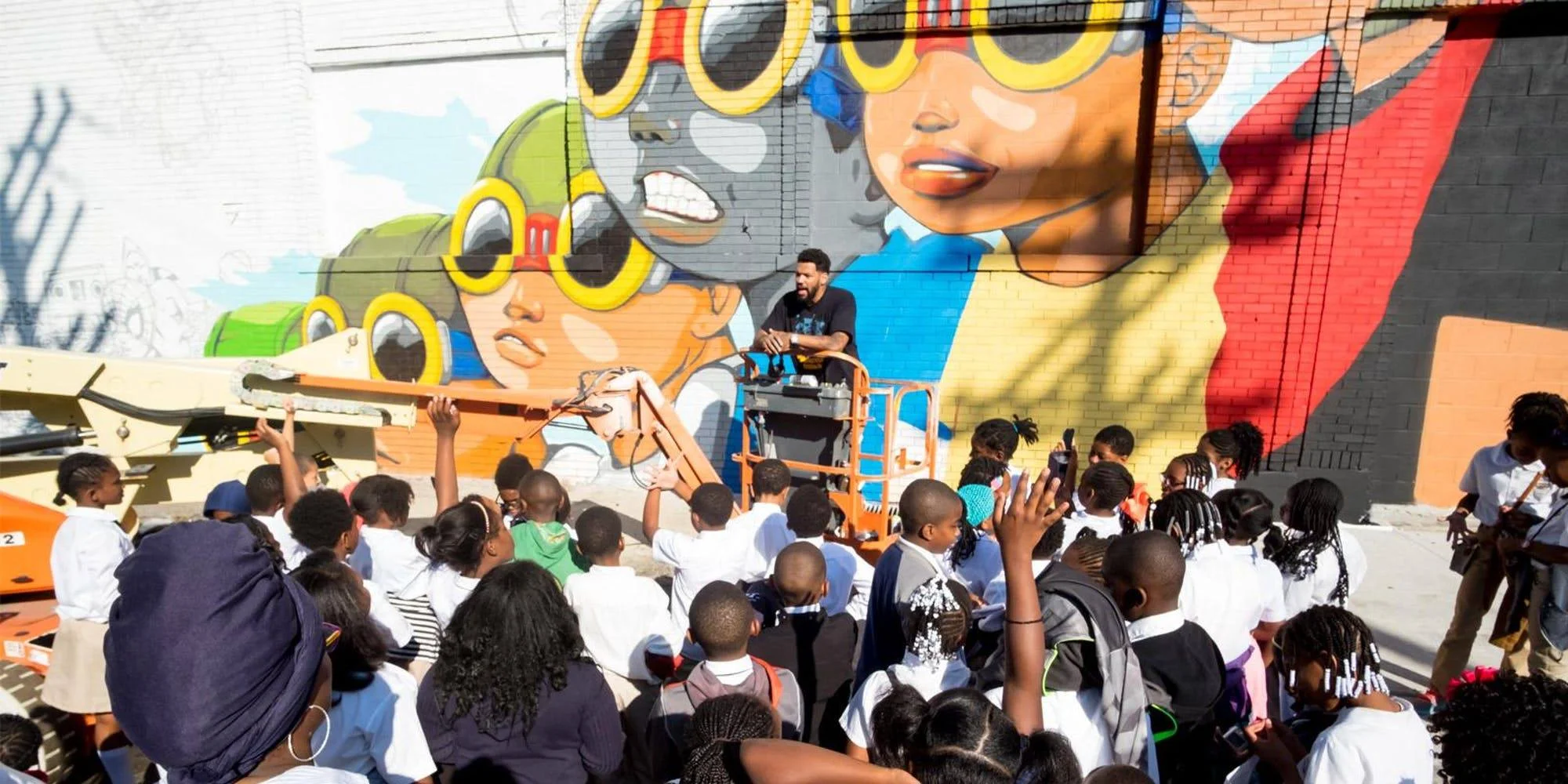 Photo via EventBrite for "Murals in the Market Walking Tour" on Facebook