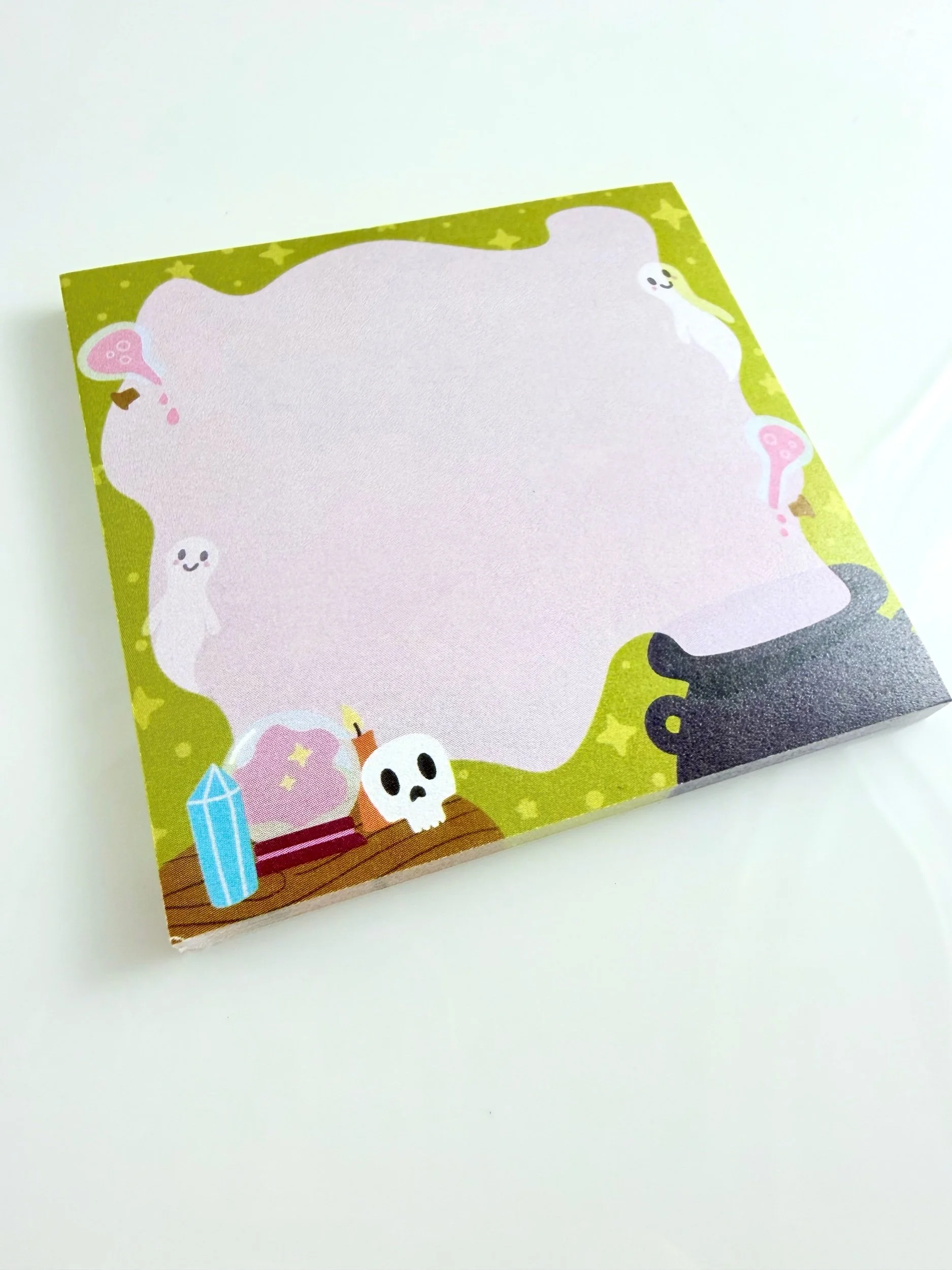 square notepad with cauldron spilling out lavender smoke