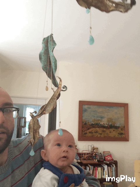  My niece Zoey discovering her mobile!