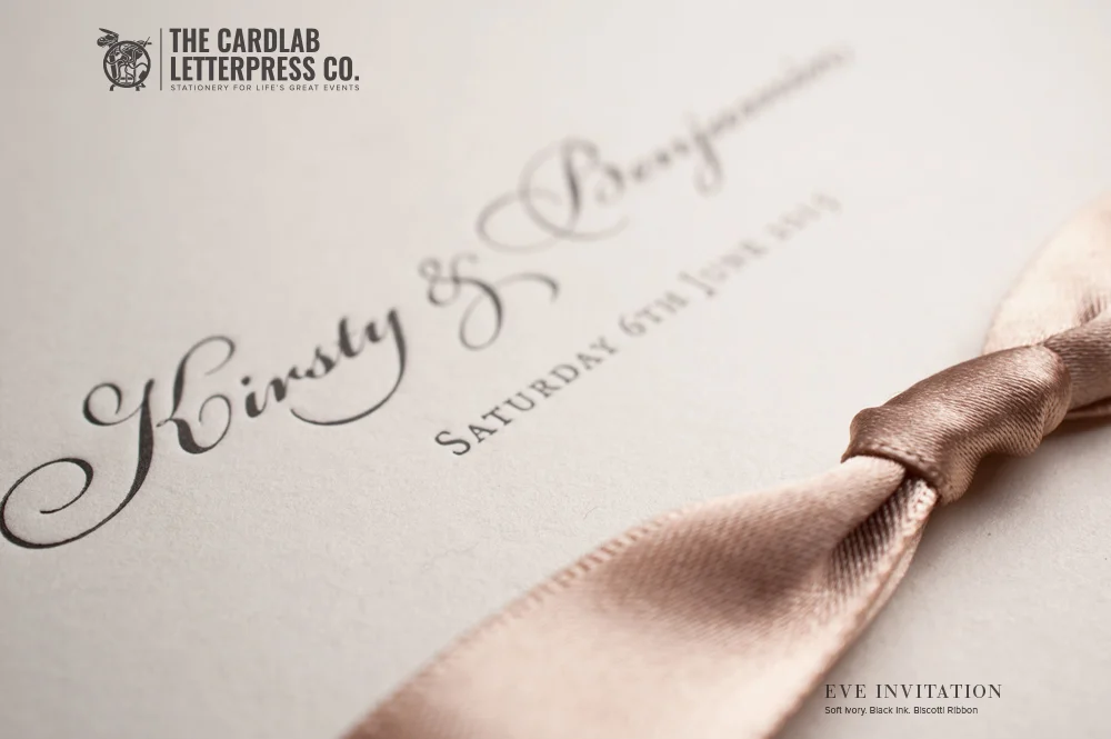 Close up of Biscotti ribbon on soft ivory card with Letterpress in Back ink