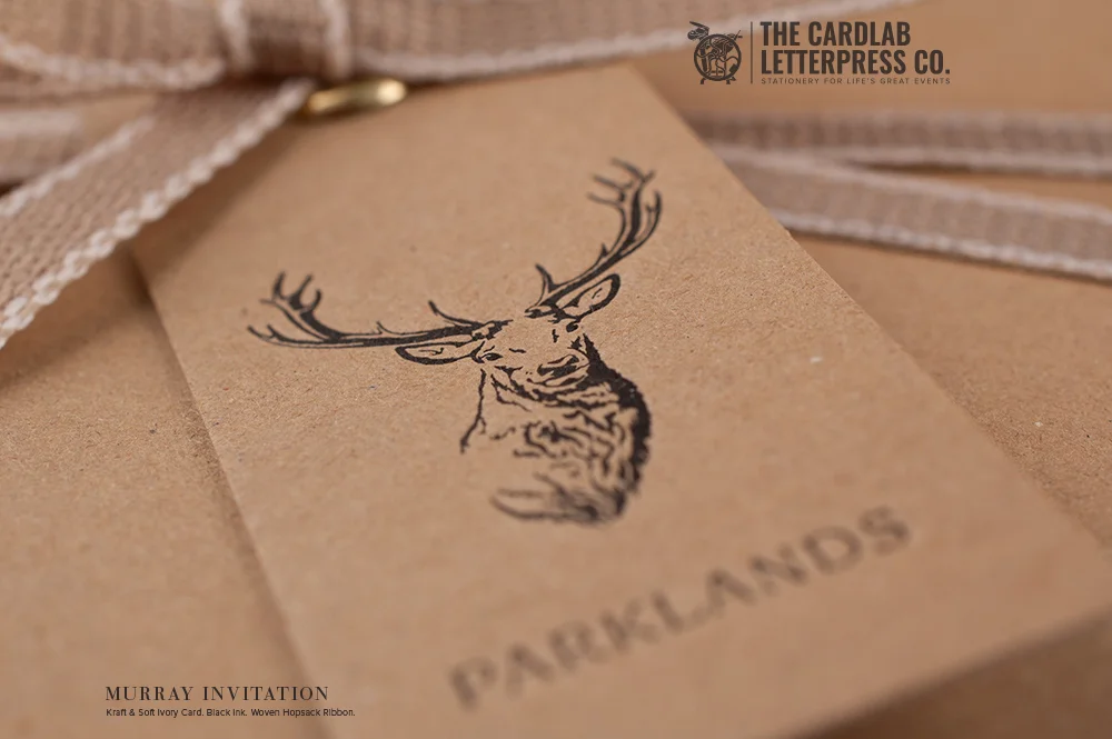 Close up of Stag Motif on Rustic Kraft Card Murray Invite