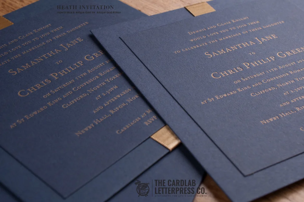 Close Up of Antique Gold Letterpress Ink on Navy Card