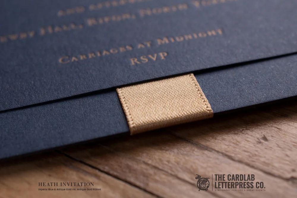 Antique Gold Letterpress Ink on Navy Blue Invite