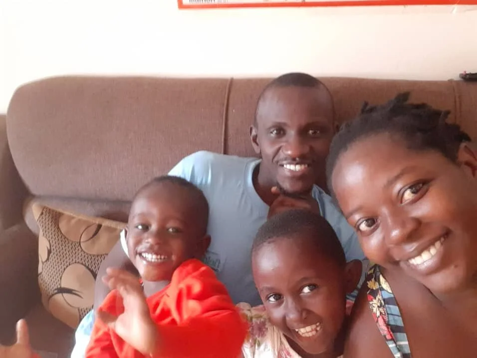 Gemma with foster family.JPG