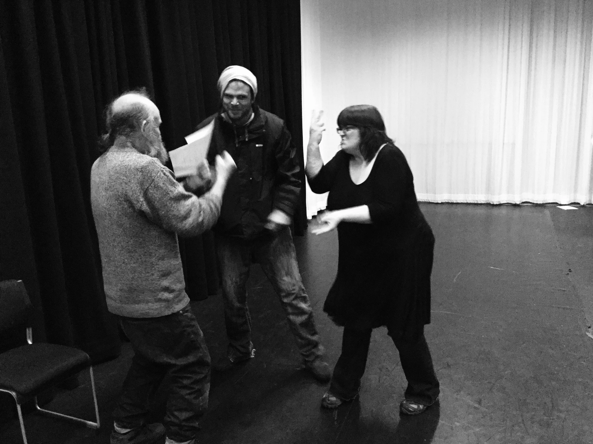 Three actors from In The Moment create responses to ideas using scripts and improvisation