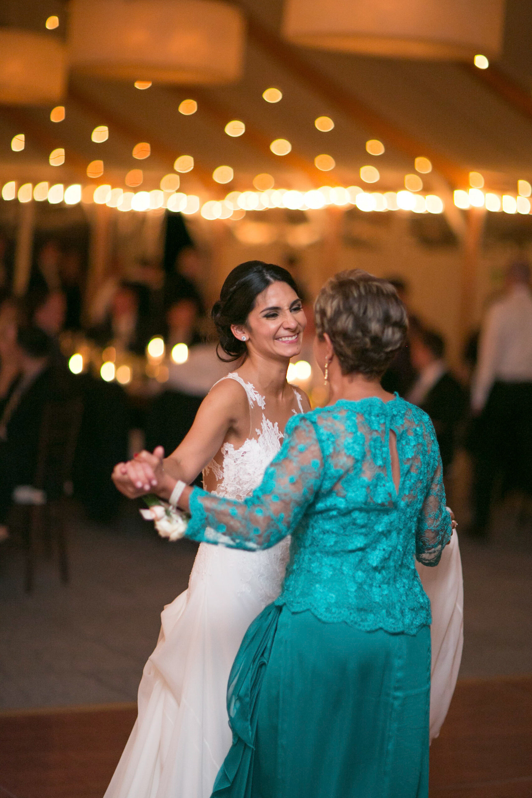 BRIDE AND HER MOTHER DANCE AT CASTLE HILL INN WEDDING, NEWPORT RI