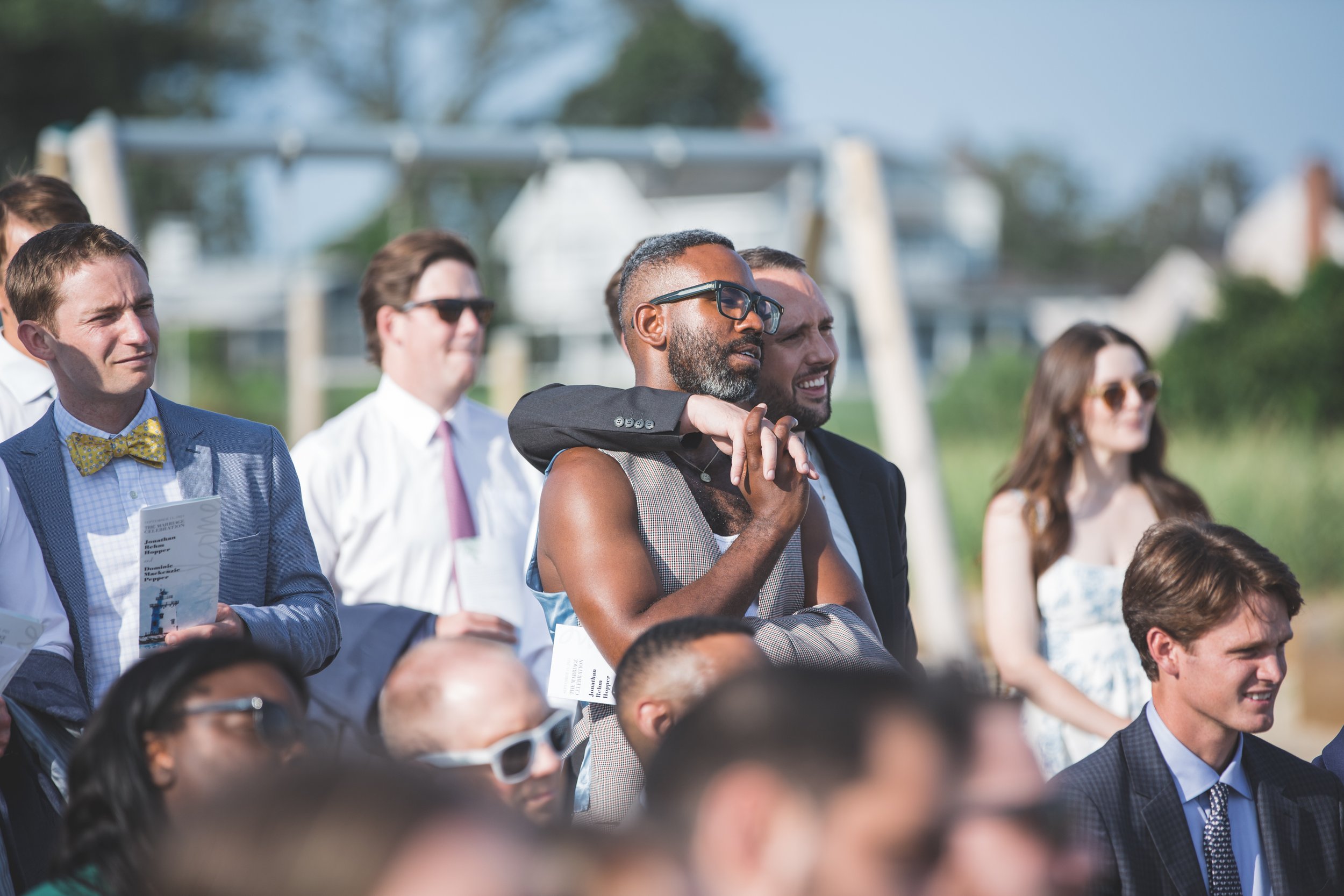 Guests Look On at Same-Sex Wedding