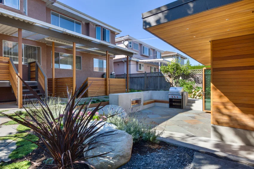 Shared space: the typical Vancouver rear yard will be shared between the main house, the basement suite entry well, and the laneway house. Photo: Colin Perry / Lanefab