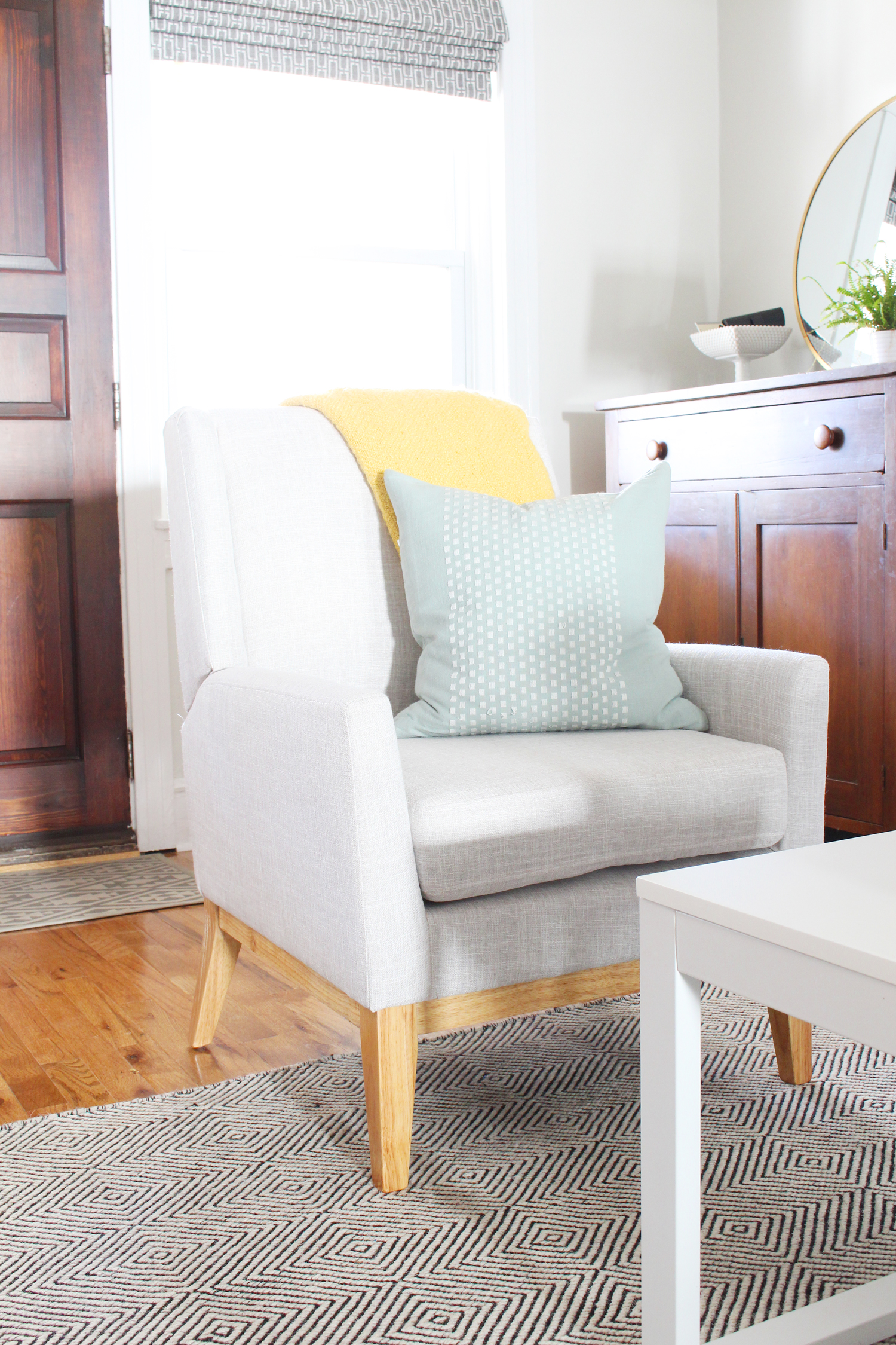 Mid-century style accent chair in gray