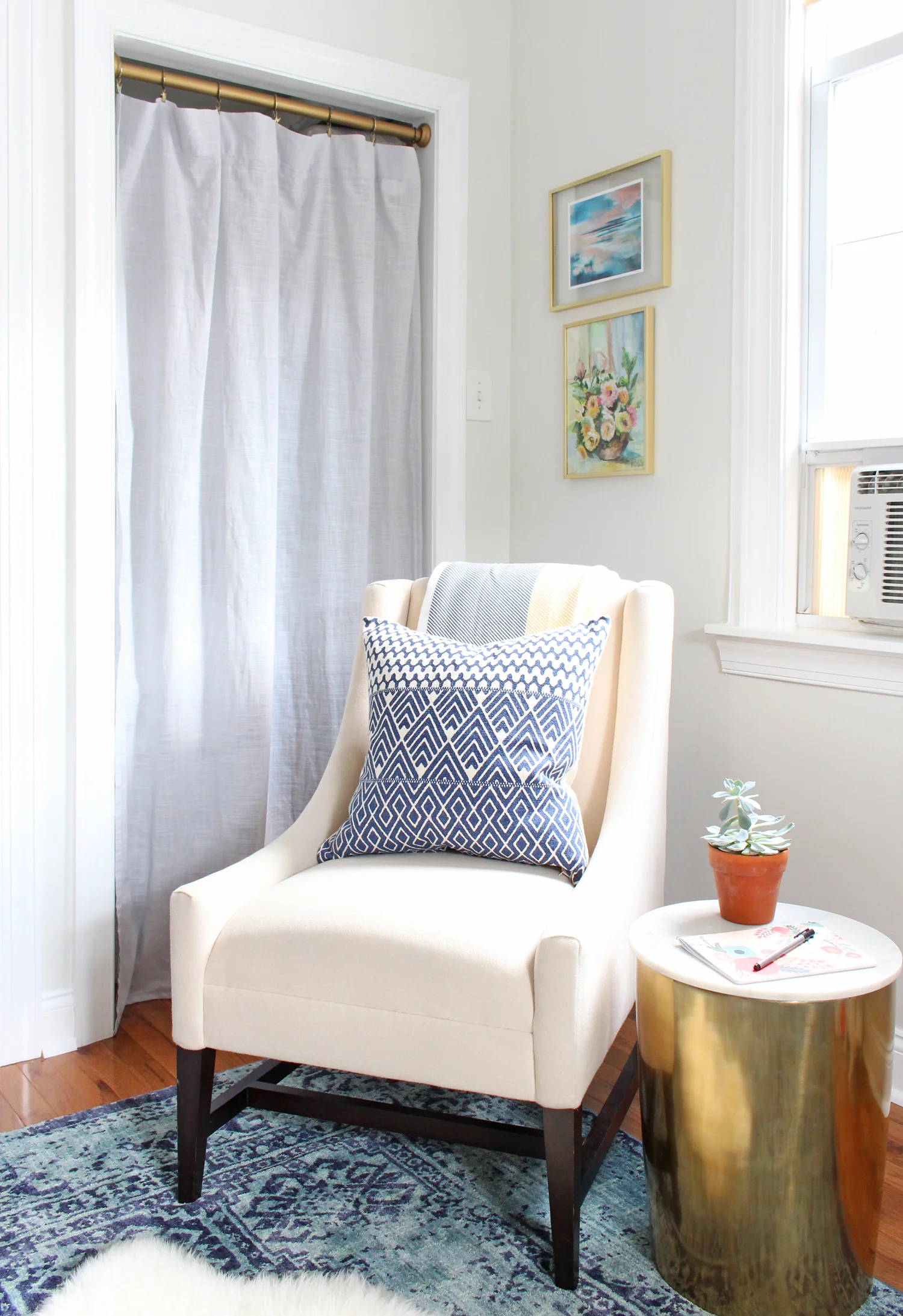 Cozy corner for reading and watching TV in Mix & Match Design Company's home office.