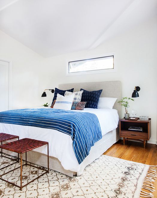 Get the look of this bright and airy, California eclectic bedroom. The mid-century modern and bohemian styles play together beautifully in this bedroom from Amber Interiors.