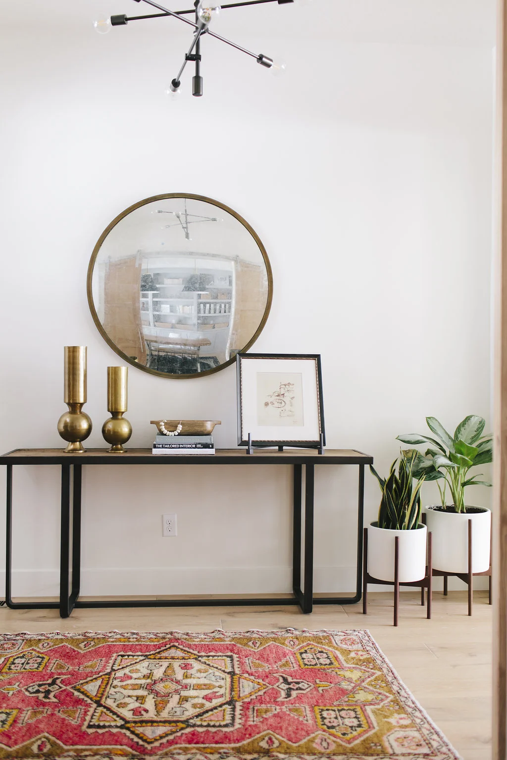 Cozy mid-century eclectic entryway.