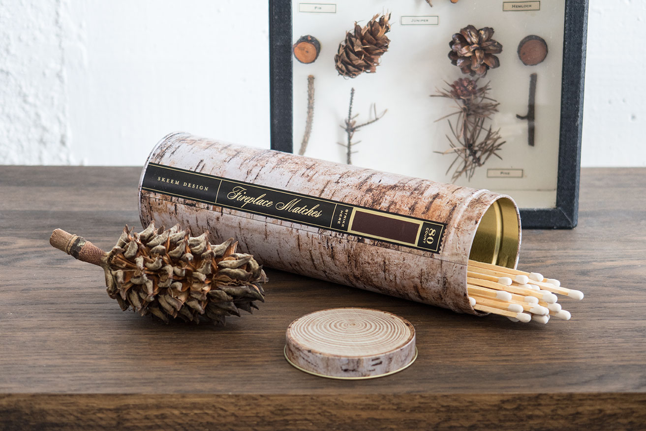 Skeem Design's birch log fireplace matches.