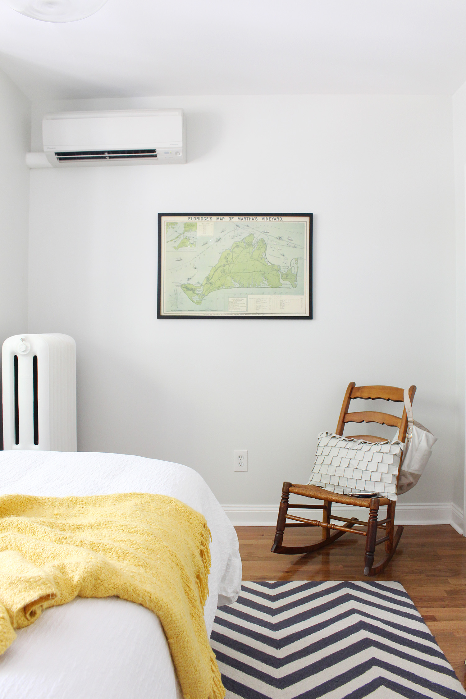 An interior designer's modern eclectic master bedroom.he T