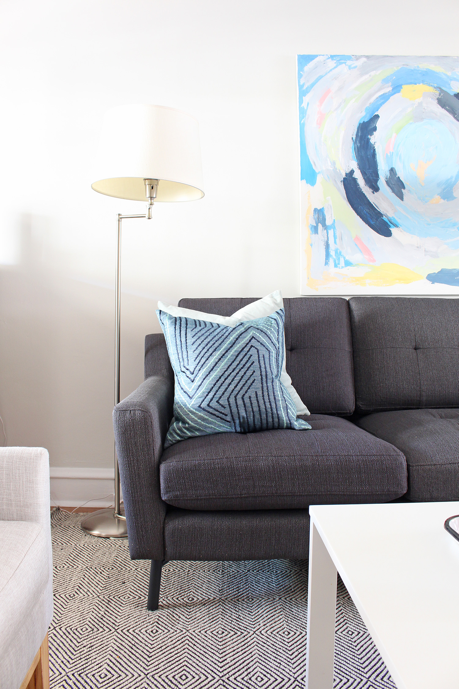 A new gray mid-century modern sofa updates the look of this living room. Head to Burrow.com to purchase your sofa and use code MIXANDMATCH to get $50 off of your purchase.