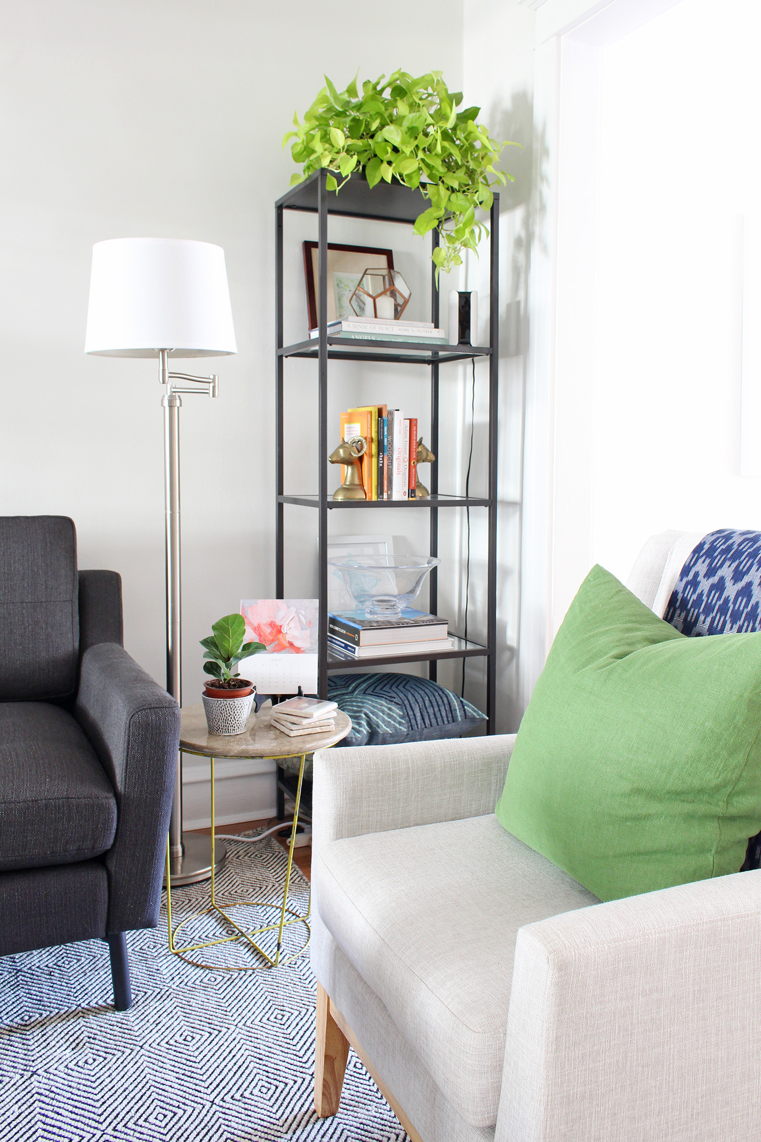 A new gray mid-century modern sofa updates the look of this living room. Head to Burrow.com to purchase your sofa and use code MIXANDMATCH to get $50 off of your purchase.