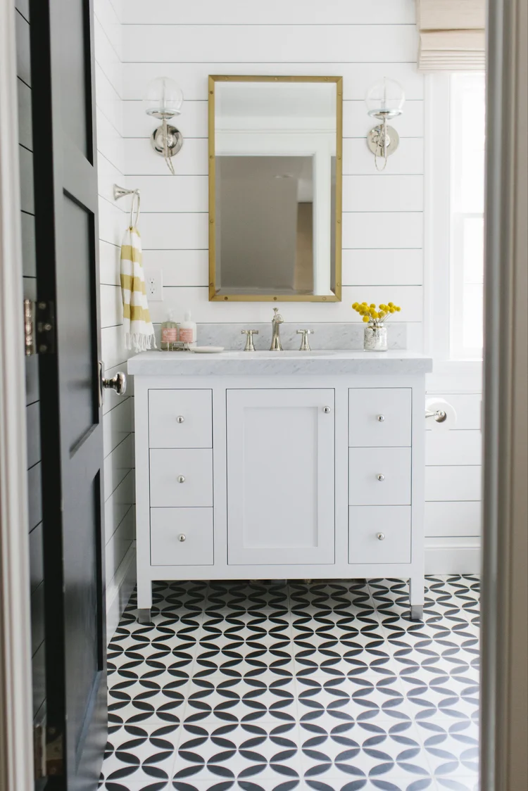 Shiplap in a powder room by Studio McGee // patterned floor tile, modern farmhouse bathroom