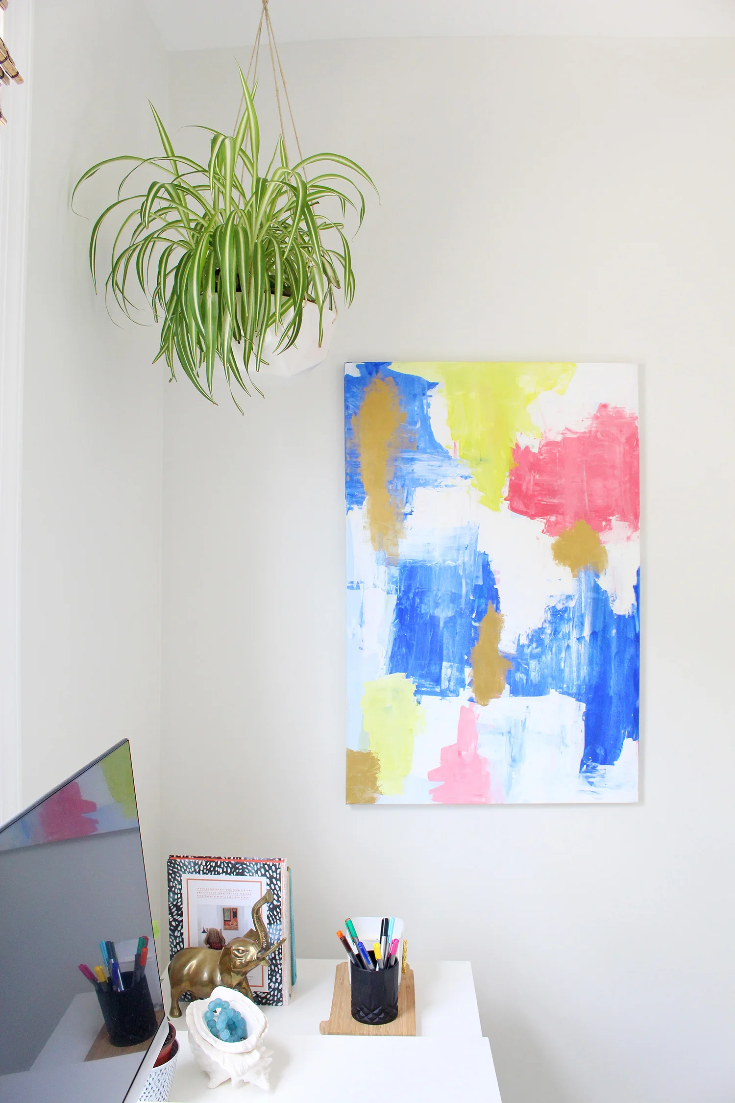 Convivial Production's 2V Geometric Hanging Planter in Mix & Match Design Company's home office. | modern ceramic planter, modern home decor, decorating with plants