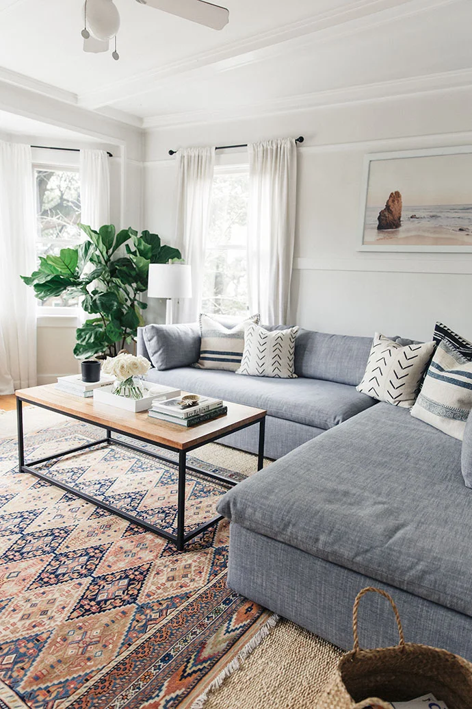 Layered-Rugs-Gray-Sofa-Modern-Eclectic-Living-Room.jpg