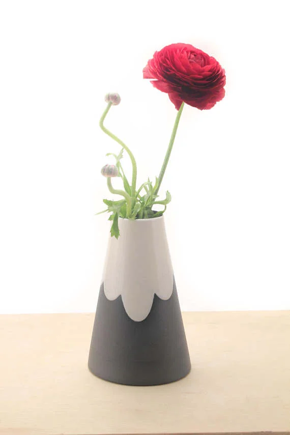 Shop small for Small Business Saturday! This post has a roundup of some of the best Etsy shops for home and decor. (Ceramic cone mountain vases from Bean & Bailey)