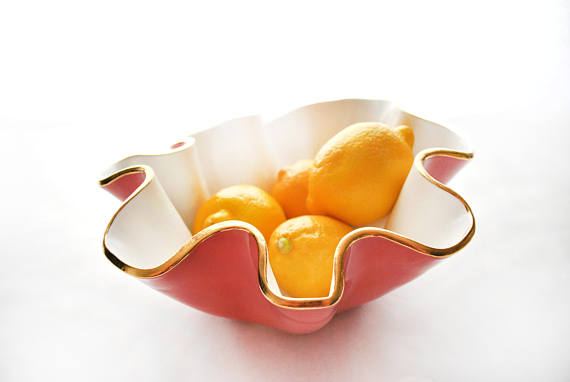 Shop small for Small Business Saturday! This post has a roundup of some of the best Etsy shops for home and decor. (wavy serving bowl with gold edge from Susan Gordon Pottery)