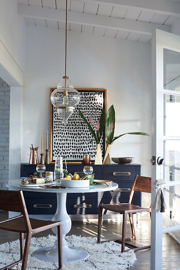 Get the look of this traditional meets eclectic dining room on the blog! / Glam dining room, round pedestal dining table, navy brass white dining room